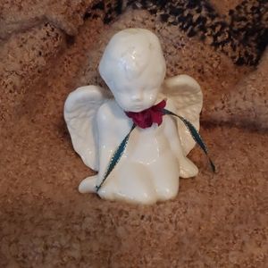 Small porcelain cherub